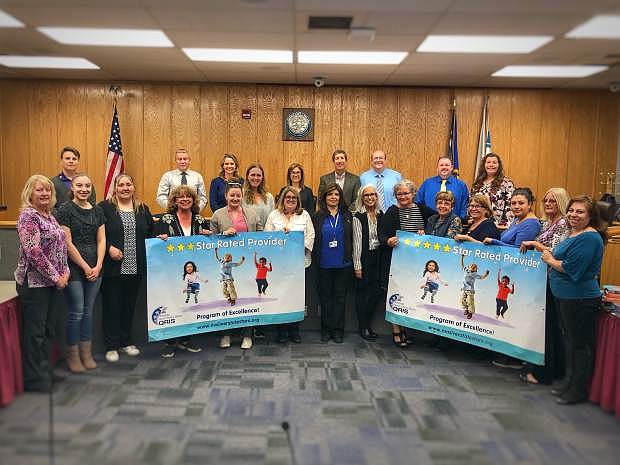 Carson City School District staff gather to celebrate its latest pre-kindergarten program results from the Quality Rating and Improvement Systems scores for Fremont, Mark Twain and Bordewich elementary schools and Student Support Services.
