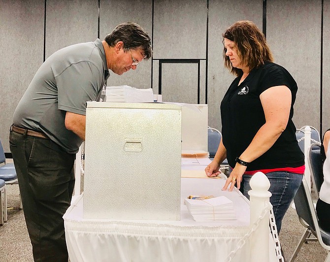  city council will canvas the votes according to state law at its next meeting on Monday and certify the winner.Photo: City Clerk Gary Cordes, left, and Deputy City Clerk Elsie Lee prepare ballots for counting.
