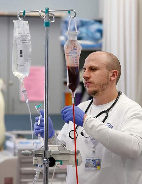 Jacob Phillips works in a nursing lab on April 9 at Western Nevada College in Carson City.