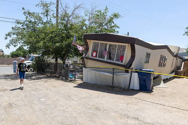 A child walks by one of the mobile homes knocked off its foundation by an earthquake in Ridgecrest, Calif., on Friday July 5, 2019. The strongest earthquake in 20 years shook a large swath of Southern California and parts of Nevada on the July 4th holiday, rattling nerves and causing injuries and damage in a town near the epicenter, followed by a swarm of ongoing aftershocks. The 6.4 magnitude quake struck Thursday morning in the Mojave Desert, about 150 miles northeast of Los Angeles, near the town of Ridgecrest. (James Quigg/The Daily Press via AP)