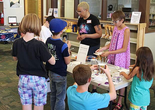 On the 50th anniversary of the moon landing, the library conducted a round-robin afternoon of various stations for youngsters to learn more about space exploration.