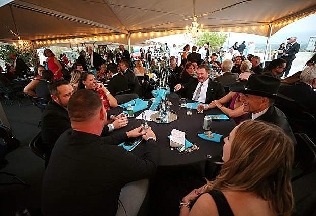 Guests enjoy the Western Nevada College Foundation&#039;s Reach for the Stars black-tie gala at the Jack C. Davis Observatory on Aug. 11, 2018.
