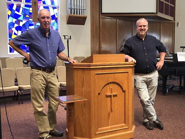 Retiring Pastor Bruce Kochsmeier, left, and incoming Pastor Bob Davis stand at the pulpit inside First Presbyterian Church's sanctuary that was completed in 2008. Kochsmeier is FPC's longest tenured leader of the congregation. Davis was chosen to serve as the church's 38th pastor from Chula Vista, Calif.