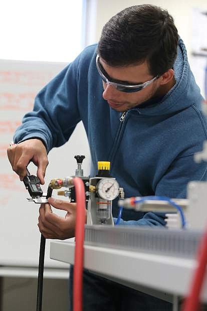 Mechatronics students work on Aug. 12, 2018, at Western Nevada College in Carson City.
