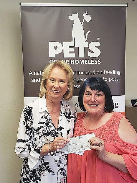 Genevieve Frederick (left) of Feeding Pets of the Homeless and Maureen Shannon of DV8.