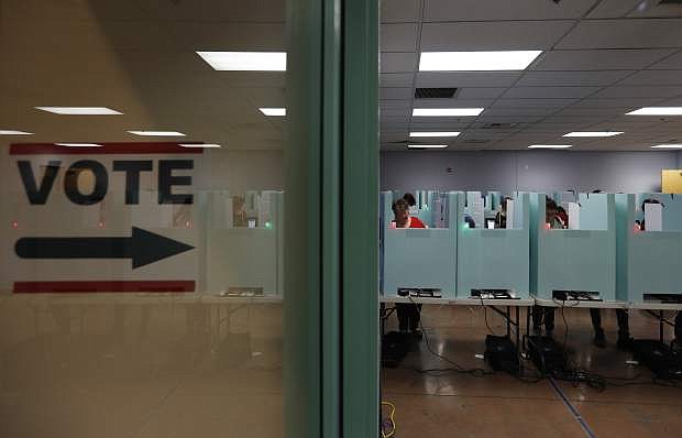 A polling place in Las Vegas on Nov. 6. A man who was told he couldn&#039;t create a &quot;WTF Party&quot; for political candidates in Nevada is suing state election officials in federal court, claiming that blocking him violates his constitutional right to freedom of speech.