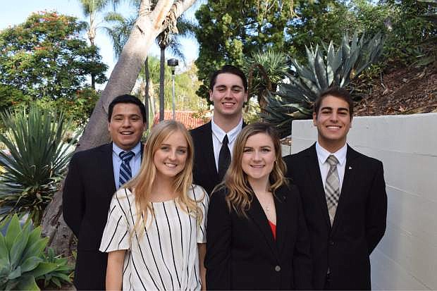 Avery Castell, lower right, plans to begin fall classes and will serve as president of the Rho Phi Chapter of Delta Sigma Pi at Concordia University, Irvine.