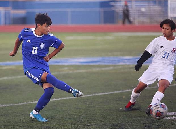 Christofer Palacio Nevares boots the ball up to a striker during Carson&#039;s 4-1 win over Reno Wednesday.