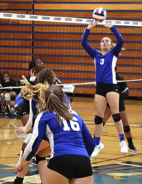 Abby Lemburg (3) passes the ball to a hitter Thursday during Carson volleyball&#039;s straight-set win over Hug.