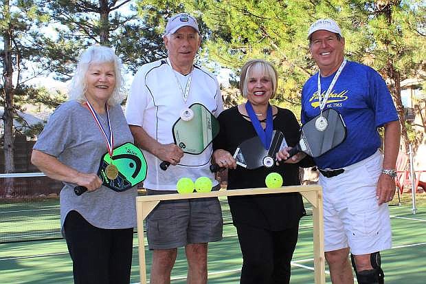Playing pickleball has become the sport du jour. Showing off their medals are pickleball enthusiasts, from left, Helen Frank, Chuck Selover, Juana Beguelin and U.S. Pickleball Association Ambassador Dave Whitefield.