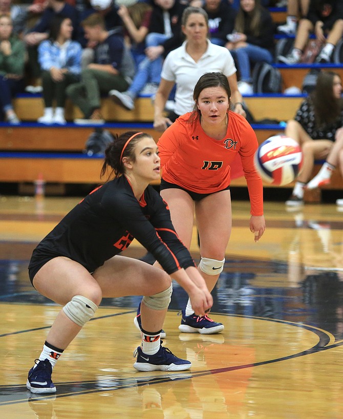 Douglas High&#039;s Kate Talia gets underneath a serve from Carson Tuesday night. 
