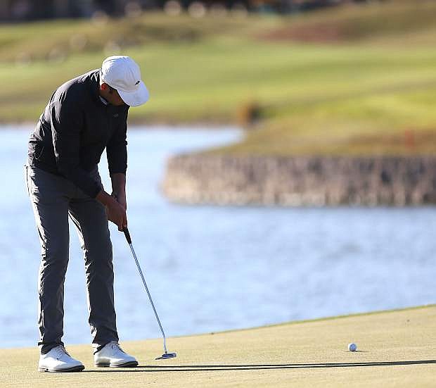 Reno native Trent Virden putts on the 18th hole at his third Q-school qualifying tournament at Dayton Valley Golf Course Wednesday. Virden sat in contention to qualify after the third round of play.