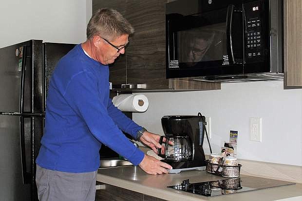Steven Kehm, general manager My Place Hotels, shows off the kitchenette units in the new extended stay hotel in north Carson City.