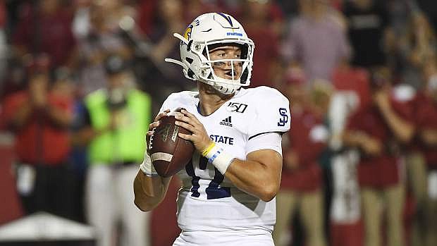 San Jose State quarterback Josh Love drops back to pass against Arkansas during an NCAA college football game, Saturday, Sept. 21, 2019 in Fayetteville, Ark. (AP Photo/Michael Woods)