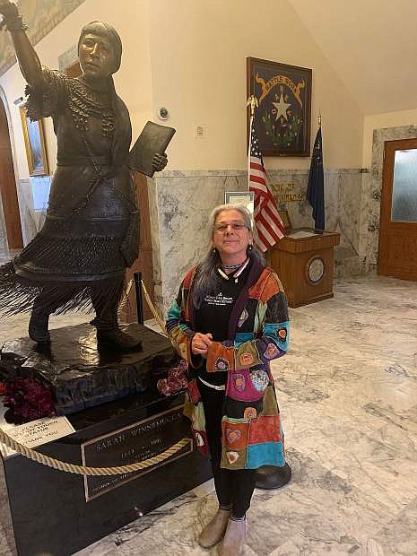 Dianna Maria de Borges at the Sarah Winnemucca statue in the Nevada Capitol.