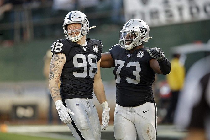 Oakland Raiders defensive end Maxx Crosby (98) has become a difference-maker in recent weeks. He has shown a knack for batting down passes at the line, forcing fumbles and putting pressure on the quarterback.