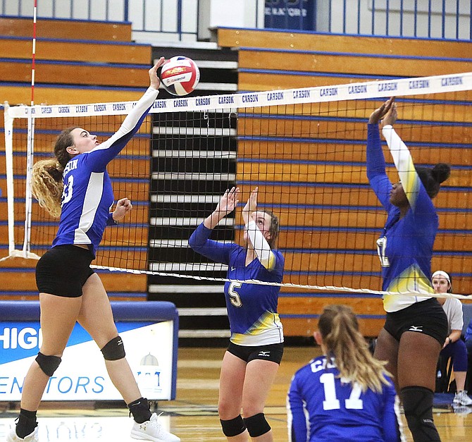 Carson High junior Cami Larkin goes up for a kill against Reed earlier this season. Larkin was selected as an honorable mention on the all-Sierra League team released Monday.