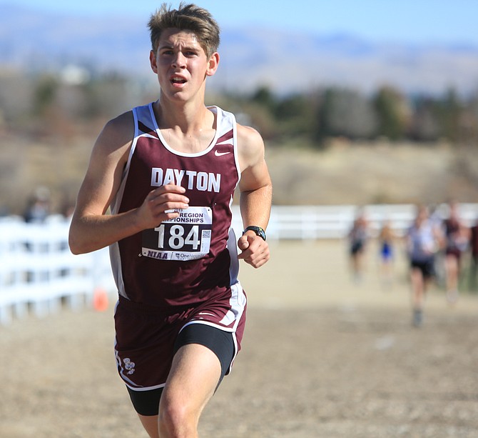 Dayton&#039;s Tyler Logan hits a straightaway in Reno during the 3A Northern Region cross country meet. Logan qualified for the state meet after taking seventh. 