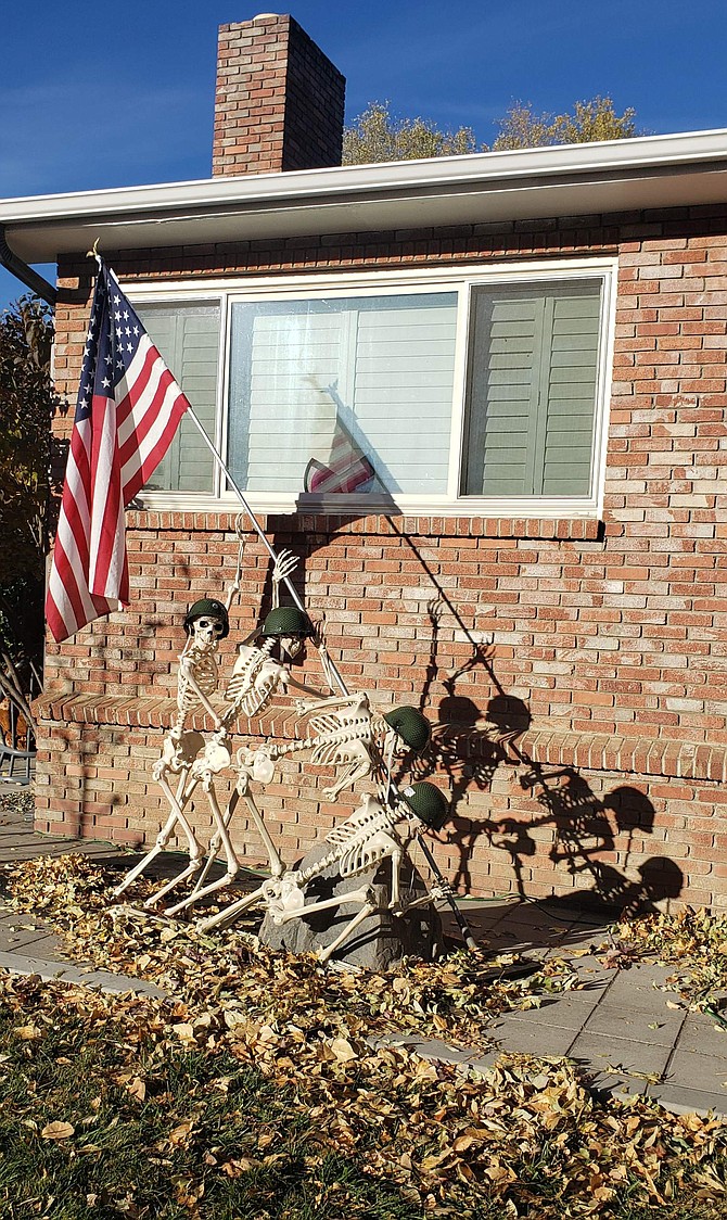 This is a Carson City resident&#039;s Halloween recreation of the Feb. 23, 1945, raising of the U.S. flag on Mount Suribachi, Iwo Jima by six Marines. Only three of the flag raisers survived the battle. Photographer Joe Rosenthal was awarded the 1945 Pulitzer Prize for his photo.