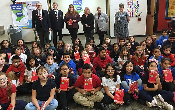 On Dec. 5, Carson City Elks Lodge #2177 Exalted Ruler Bruce Jurgensen, along with PER Kent Mayer, presented dictionaries to 76 third graders at Empire Elementary School. This is the third consecutive year that the Lodge has presented dictionaries to local third graders.