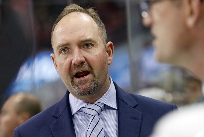 FILE - In this Oct. 26, 2018, file photo, then-San Jose Sharks&#039; head coach Peter DeBoer directs the team during the second period of an NHL hockey game, in Raleigh, N.C. The Vegas Golden Knights fired former NHL coach of the year Gerard Gallant on Wednesday, Jan. 15, 2020, amid a four-game losing streak and replaced him with Peter DeBoer. (AP Photo/Chris Seward, File)