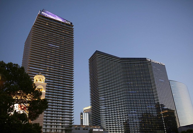 FILE - This July 1, 2018 file photo shows The Cosmopolitan in Las Vegas. The Las Vegas Strip hotel-casino is denying that O.J. Simpson was defamed in November 2017 when employees banned him from the property and a celebrity news site reported the paroled former football hero and armed robbery inmate had been drunk, disruptive and unruly. The Cosmopolitan of Las Vegas rejects Simpson&#039;s argument that his reputation was damaged by unnamed hotel staff member accounts cited in a TMZ report saying he was prohibited from returning after visits to a steakhouse and cocktail lounge. (AP Photo/John Locher, File)