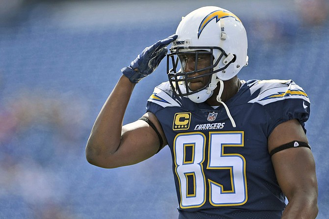 FILE - In this Sept. 16, 2018, file photo, Los Angeles Chargers&#039; Antonio Gates warms-up before an NFL football game against the Buffalo Bills, in Orchard Park, N.Y. Gates announced his retirement, Tuesday, Jan. 14, 2020,  following a 16-year career that saw him finish with 116 touchdowns, which is the most by a tight end in NFL history. (AP Photo/Adrian Kraus, File)