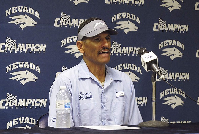 Nevada coach Jay Norvell talks to reporters in Reno on Aug. 26.