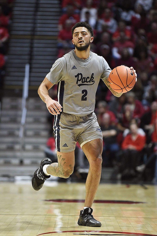 Nevada guard Jalen Harris shown against San Diego State on Jan. 18. Harris &quot;deserves to be in the conversation for Mountain West Player of the Year,&quot; Joe Santoro writes.