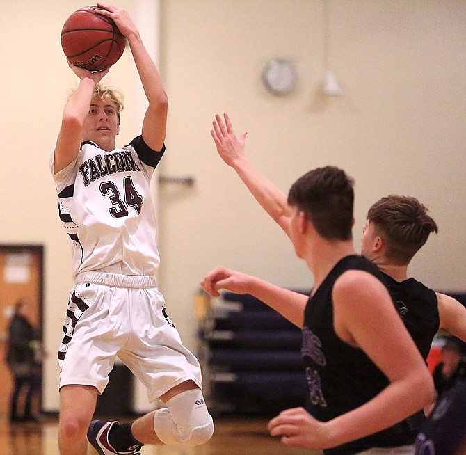 Sierra Lutheran&#039;s Luke Schinzing hits a fadeaway jumper against Redding Christian earlier this season. The senior has helped stuff the stat sheet for the Falcons this season, averaging six points, five rebounds and three assists per game.