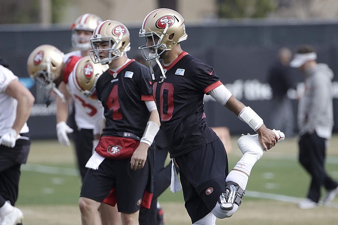 San Francisco 49ers quarterback Jimmy Garoppolo (10) stretches during practice at the team&#039;s NFL football training facility in Santa Clara, Calif., Thursday, Jan. 23, 2020. The 49ers will face the Kansas City Chiefs in Super Bowl 54. (AP Photo/Jeff Chiu)