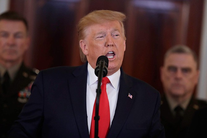 President Donald Trump addresses the nation from the White House on the ballistic missile strike that Iran launched against Iraqi air bases housing U.S. troops, Wednesday, Jan. 8, 2020, in Washington. (AP Photo/ Evan Vucci)