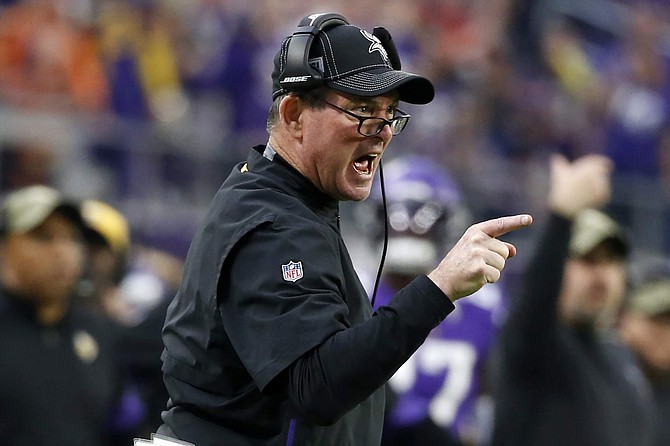 FILE - In this Nov. 17, 2019, file photo, Minnesota Vikings head coach Mike Zimmer reacts to a call during the first half of an NFL football game against the Denver Broncos, in Minneapolis. The Vikings and San Francisco 49ers play in a divisional playoff game on Saturday, Jan. 11, 2020, in San Francisco. (AP Photo/Bruce Kluckhohn, File)