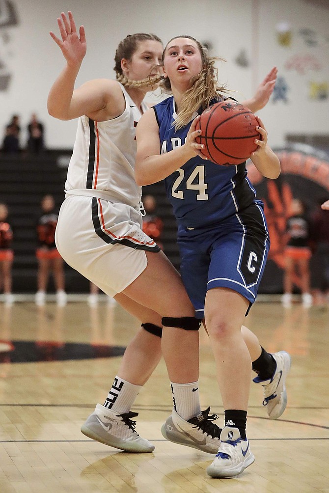 Bella Kordonowy drives to the basket against Douglas earlier this season. Kordonowy and fellow senior Lily Bouza were both named to the all-Sierra League and all-Norther Region teams for their performances this season.