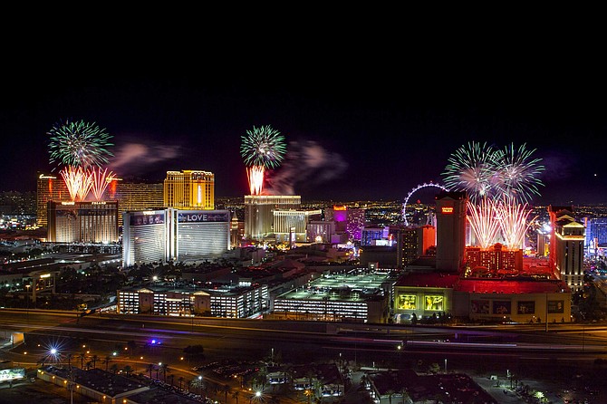 File - In this Jan. 1, 2020, file photo, fireworks for New Year&#039;s Eve erupt over the Strip as viewed from the VooDoo Rooftop Nightclub &#038; Lounge at Rio All-Suite Hotel &#038; Casino in Las Vegas. Nevada casinos reaped more than $1 billion in winnings in December, pushing the total for 2019 past $12 billion in a key index of state fiscal health. The Nevada Gaming Control Board said Thursday, Jan. 30, 2020, the statewide &quot;casino win&quot; figure was up almost 5.8% compared with the same month in 2018. (L.E. Baskow/Las Vegas Review-Journal via AP, File)