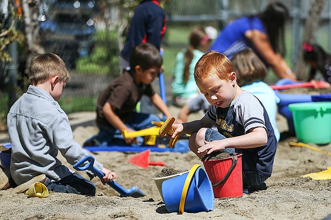 Luke Walls, 5, and fellow pre-K students play at recess at Mark Twain Elementary School in Carson City, Nev., on Tuesday, May 26, 2015.