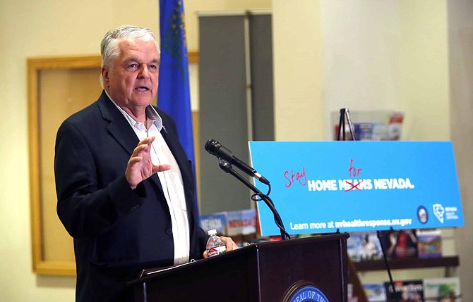 Nevada Gov. Steve Sisolak responds to a question during a news conference at the Sawyer State Building in Las Vegas, Tuesday, March 17, 2020. Sisolak ordered a monthlong closure of casinos and other non-essential businesses in order to stem the spread of the new coronavirus (COVID-19). 
