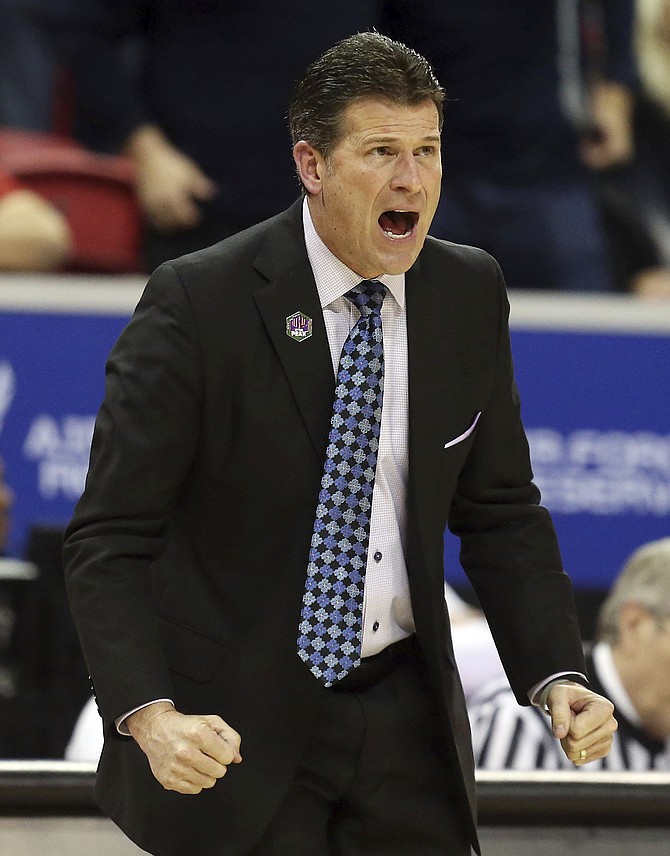Nevada head coach Steve Alford instructs his team during the second half of a Mountain West Conference tournament NCAA college basketball game against Wyoming, Thursday, March 5, 2020, in Las Vegas. Wyoming defeated Nevada 74-71. 