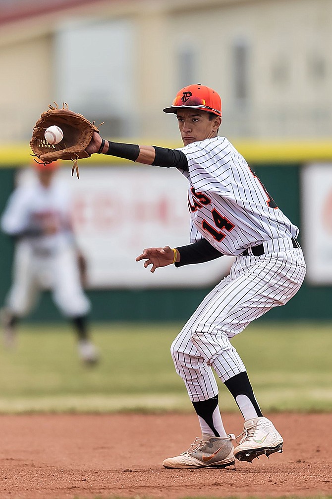 Douglas&#039; Chris Thacker field a bouncing ball last season for the Tiger baseball team. Thacker and company will be under new head coach Ryan Gonzalez this season and Gonzalez has high expectations for the Tigers, who return plenty from last season&#039;s squad.