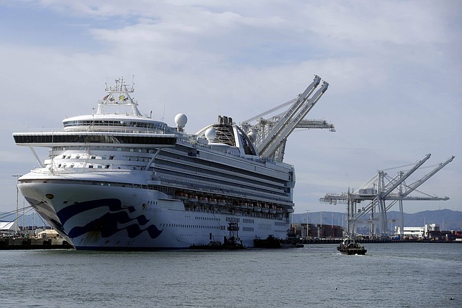 The Grand Princess cruise ship is shown docked at the Port of Oakland in Oakland, Calif., Tuesday, March 10, 2020. After days of being forced to idle off the Northern California coast, the ship docked Monday at Oakland with about 3,500 passengers and crew, including some who tested positive for the new virus.