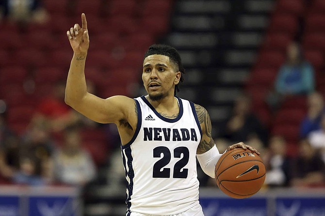 Nevada&#039;s Jazz Johnson plays against Wyoming during the first half of a Mountain West Conference tournament NCAA college basketball game Thursday, March 5, 2020, in Las Vegas.