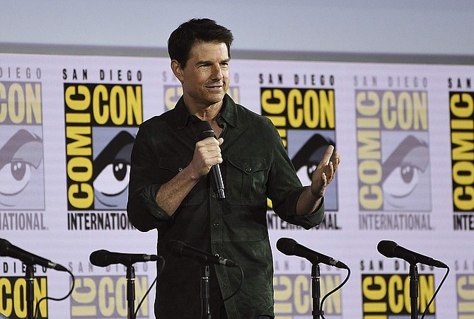 Tom Cruise presents a clip from &quot;Top Gun: Maverick&quot; on day one of Comic-Con International on Thursday, July 18, 2019, in San Diego. (Photo by Chris Pizzello/Invision/AP)