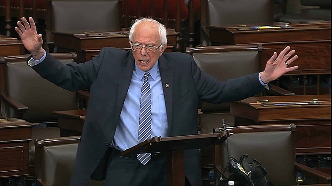 In this image from video, Sen. Bernie Sanders, I-Vt., speaks on the Senate floor at the U.S. Capitol in Washington, Wednesday, March 25, 2020. 