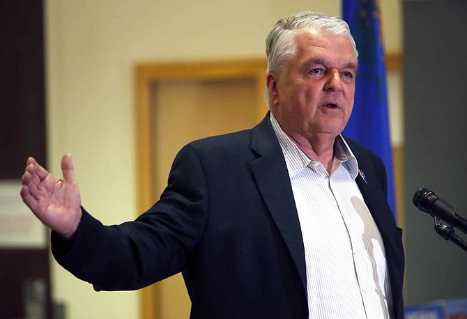 FILE - In this March 17, 2020, file photo, Nevada Gov. Steve Sisolak responds to a question during a news conference at the Sawyer State Building in Las Vegas. Nevada&#039;s top legislative Republican called Thursday, April 16, 2020, for the governor to outline plans for reopening casinos and nonessential businesses closed since mid-March due to the coronavirus pandemic, and to say whether he&#039;ll extend the closure order past April 30. 