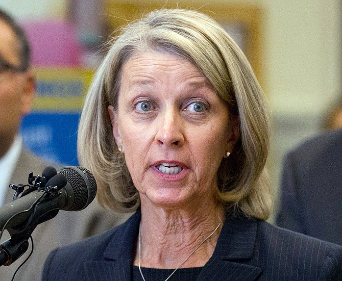 FILE - In this Oct. 18, 2016, file photo, Nevada&#039;s Secretary of State Barbara Cegavske speaks during a press conference in Las Vegas. Attorney General Aaron Ford, a Democrat and his office are defending Cegavske&#039;s plan to conduct Nevada&#039;s June 9, 2020, primary election predominantly by mail because of COVID-19. A federal judge in Reno has scheduled a hearing on a lawsuit that claims the plan would deny some Nevadans their constitutional voting rights. 