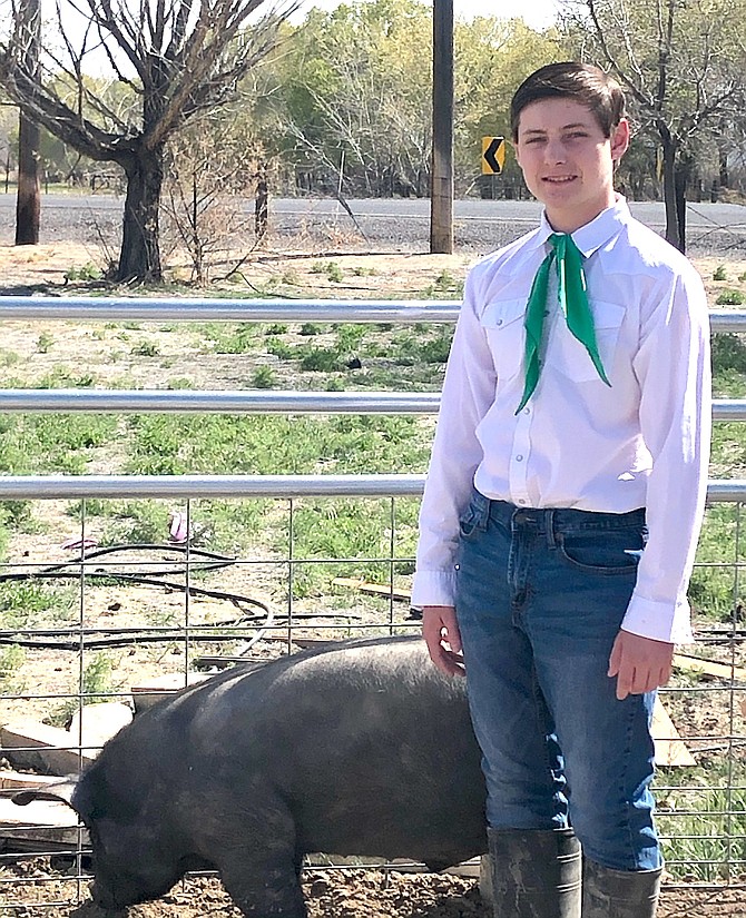 Royce Mills, 15, will show his hog Black Forest in a virtual
Churchill County Junior Livestock Show and Sale this weekend.