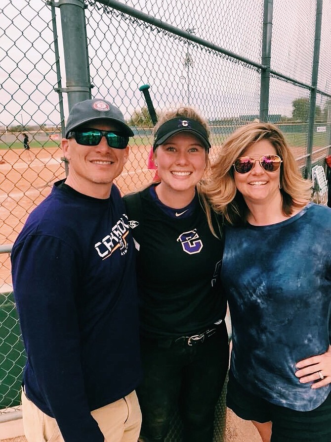 
Fallon grad Megan McCormick, who was playing in her final season of softball at Carroll College when the pandemic forced the season to be stopped, relied on her parents&#039; (pictured are Tom and Missy) support during her career.
