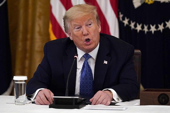 President Donald Trump speaks during a Cabinet Meeting in the East Room of the White House, Tuesday, May 19, 2020, in Washington. 
