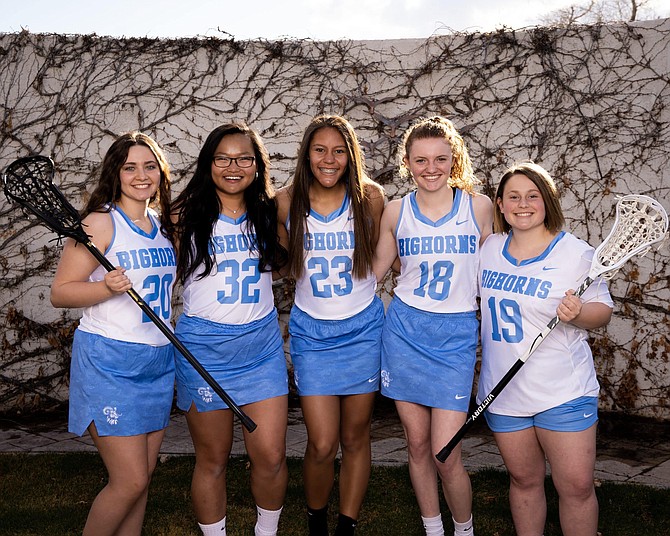 The Oasis Academy girls lacrosse team featured five seniors, including, from left, Churchill County High School student Jaidyn Delgado, and Oasis Academy students Elizabeth Williams, Brooklynn Whitaker, Emily Richards and Kate Dunkin. Richards was named one of the top four Oasis Academy seniors.