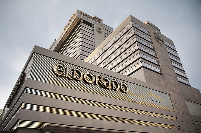FILE - In this June 24, 2019, file photo, the Eldorado Resort Casino stands in Reno, Nev. Reno-based Eldorado Resorts Inc. received the go-ahead from Nevada casino regulators to buy Caesars Entertainment Corp. in a $17 billion deal creating a gambling giant with properties in 16 U.S. states and several other countries. The merger won unanimous endorsement Wednesday, July 8, 2020, after pointed questions from Nevada Gaming Control Board regulators and unanimous approval from the state Gaming Commission. Approval in coming days from regulators in Indiana and New Jersey would create the world&#039;s largest casino company under the Caesars Entertainment name. 